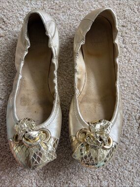 Stuart Weitzman Metallic Gold Ballet Flats with Knot & Snakeskin Accent
